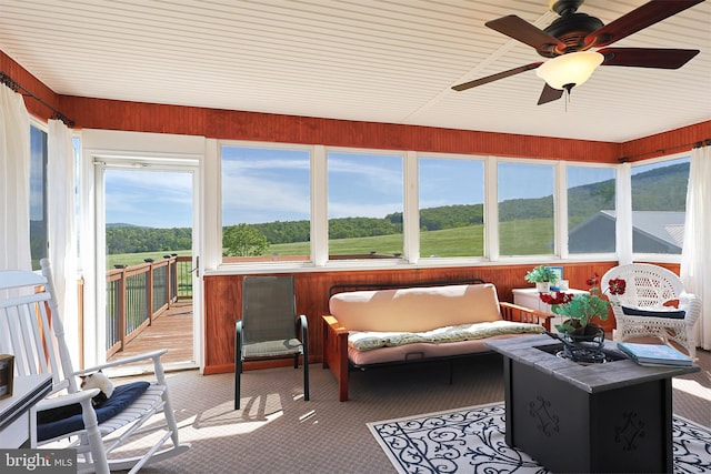14600 Barton Blvd SW, Cresaptown, MD 21502 - sunroom / solarium featuring carpet flooring, a ceiling fan, wood walls, and an outdoor living space
