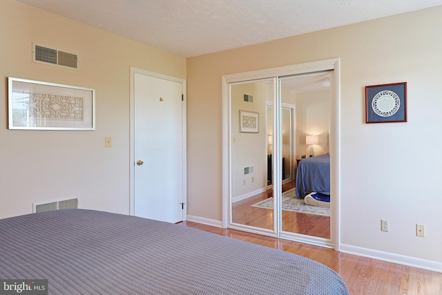 14600 Barton Blvd SW, Cresaptown, MD 21502 - bedroom with wood finished floors, baseboards, and a closet