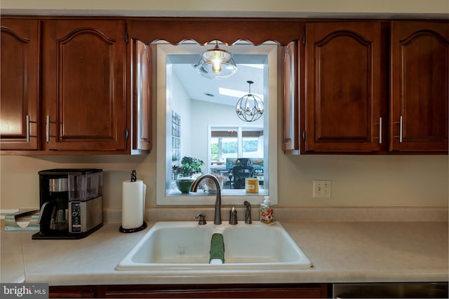 14600 Barton Blvd SW, Cresaptown, MD 21502 - kitchen featuring a sink, light countertops, dishwasher, and a chandelier