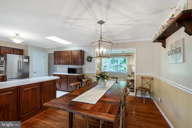 14600 Barton Blvd SW, Cresaptown, MD 21502 - dining space with a skylight, wood finished floors, a chandelier, ornamental molding, and baseboards