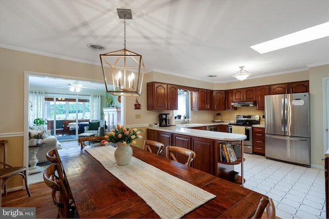 14600 Barton Blvd SW, Cresaptown, MD 21502 - dining room with plenty of natural light, ornamental molding, a skylight, and a ceiling fan