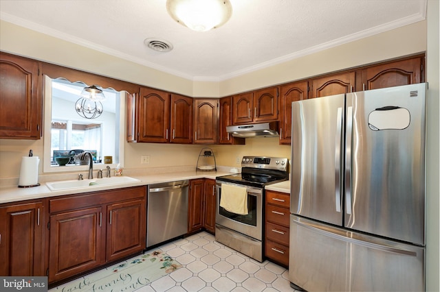 14600 Barton Blvd SW, Cresaptown, MD 21502 - kitchen with stainless steel appliances, under cabinet range hood, a sink, light countertops, and crown molding
