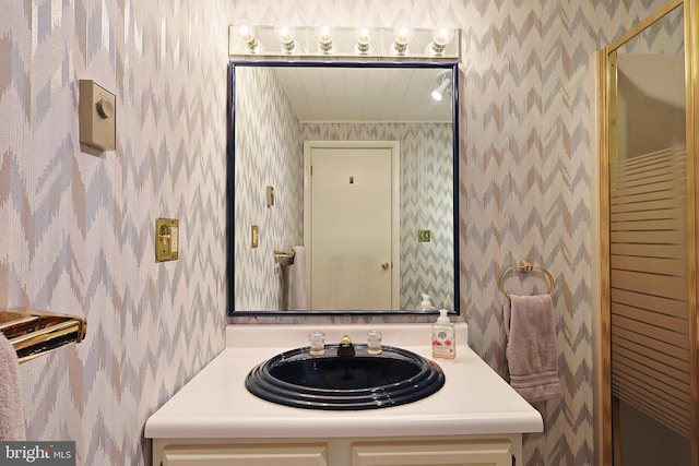 14600 Barton Blvd SW, Cresaptown, MD 21502 - bathroom with wallpapered walls and vanity
