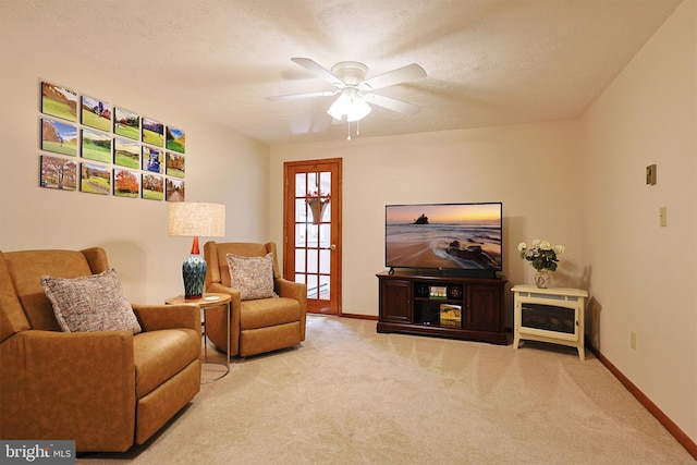 14600 Barton Blvd SW, Cresaptown, MD 21502 - living area with carpet, ceiling fan, baseboards, and a textured ceiling