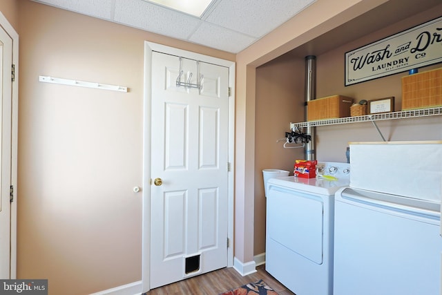14600 Barton Blvd SW, Cresaptown, MD 21502 - laundry area with washing machine and dryer, wood finished floors, and baseboards