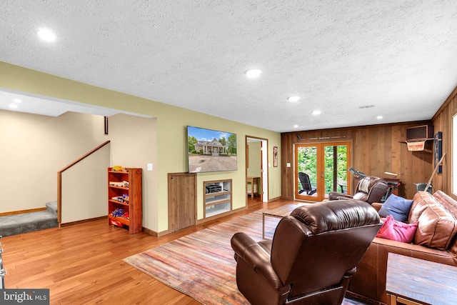 210 Providence Rd, Annapolis, MD 21409 - living area with wood finished floors, stairs, a textured ceiling, baseboards, and recessed lighting