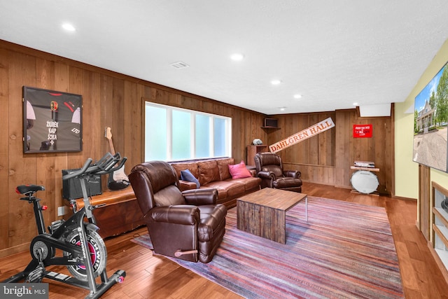 210 Providence Rd, Annapolis, MD 21409 - living area with wooden walls, wood finished floors, recessed lighting, and baseboards