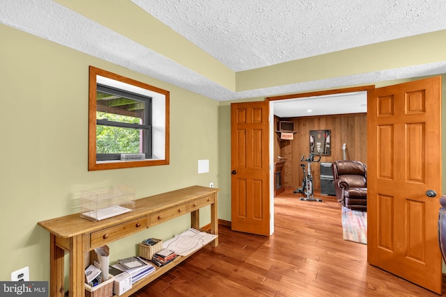 210 Providence Rd, Annapolis, MD 21409 - hallway featuring a textured ceiling, wood finished floors, and baseboards