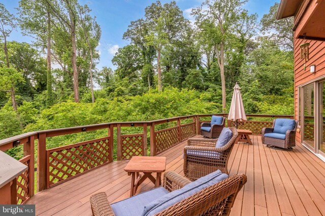 210 Providence Rd, Annapolis, MD 21409 - wooden deck with view of wooded area