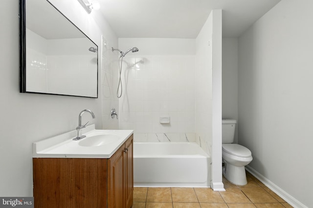 1208 Larchmont Ave, Capitol Heights, MD 20743 - full bathroom with vanity, toilet, tile patterned floors, bathtub / shower combination, and baseboards