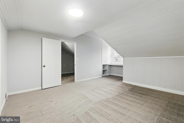 1208 Larchmont Ave, Capitol Heights, MD 20743 - additional living space with vaulted ceiling, carpet floors, and baseboards