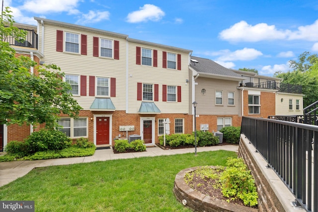 122 N Bedford St Unit A, Arlington, VA 22201 - view of front of house with brick siding and central AC unit