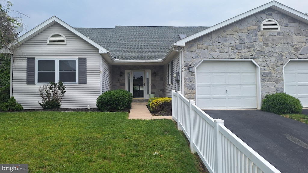 106 Sarah Ct, Lewisberry, PA 17339 - ranch-style home with stone siding, driveway, a shingled roof, and an attached garage