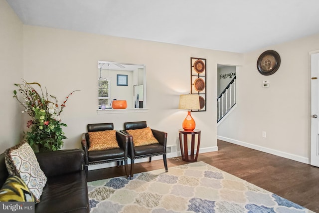 504 Domain Ct, Odenton, MD 21113 - sitting room featuring stairs, wood finished floors, and baseboards
