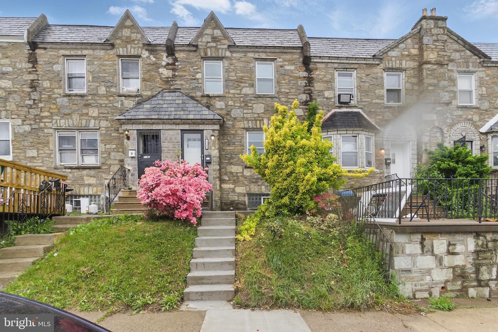 1344 Hellerman St, Philadelphia, PA 19111 - townhome / multi-family property featuring a high end roof and stone siding