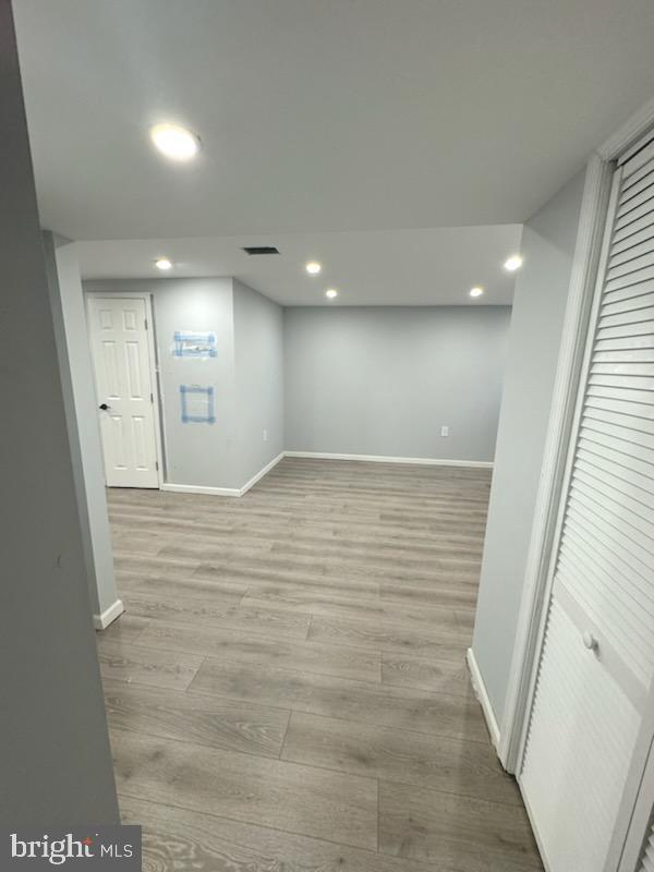 5303 55th Pl, Riverdale, MD 20737 - below grade area featuring light wood-style floors, baseboards, and recessed lighting