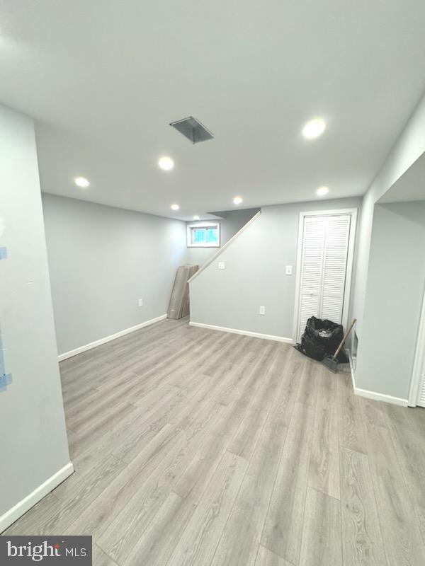 5303 55th Pl, Riverdale, MD 20737 - finished basement featuring light wood-style flooring, baseboards, and recessed lighting