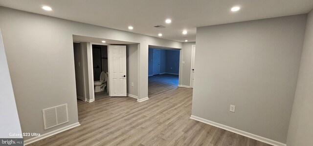 5303 55th Pl, Riverdale, MD 20737 - spare room with recessed lighting, light wood-style flooring, and baseboards