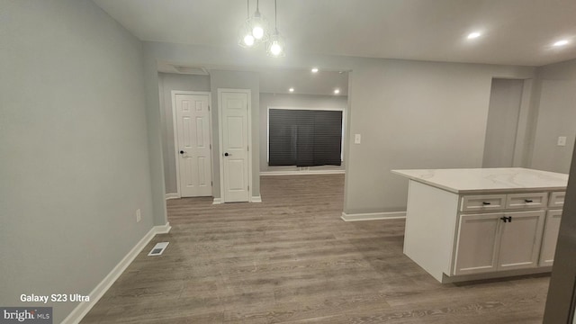 5303 55th Pl, Riverdale, MD 20737 - hall with baseboards, wood finished floors, and recessed lighting