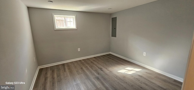 5303 55th Pl, Riverdale, MD 20737 - spare room featuring electric panel, wood finished floors, and baseboards