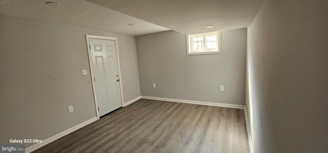 5303 55th Pl, Riverdale, MD 20737 - basement with dark wood finished floors and baseboards