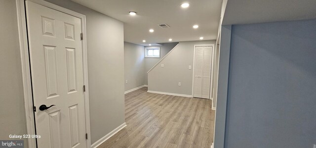 5303 55th Pl, Riverdale, MD 20737 - below grade area with light wood-style floors, recessed lighting, and baseboards