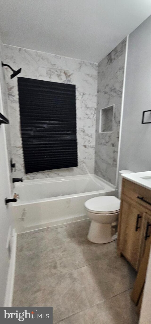 5303 55th Pl, Riverdale, MD 20737 - bathroom featuring toilet, vanity, and shower / washtub combination