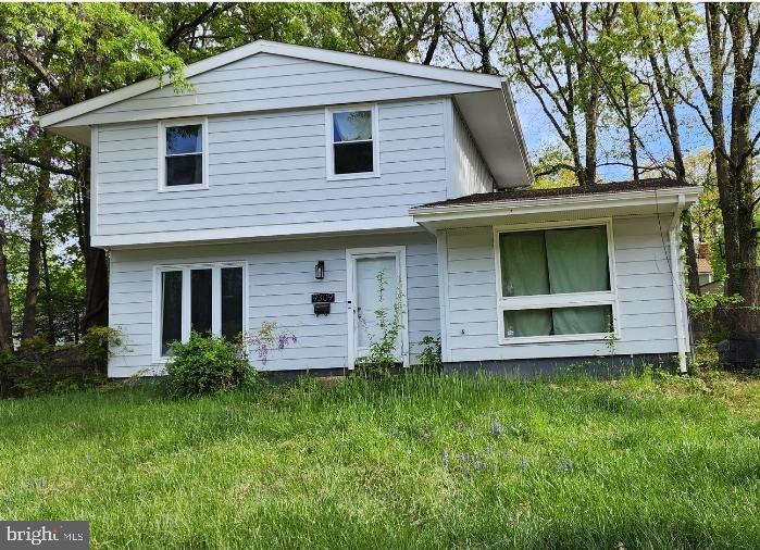 9309 Kimbark Ave, Lanham, MD 20706 - view of front of house with a front lawn