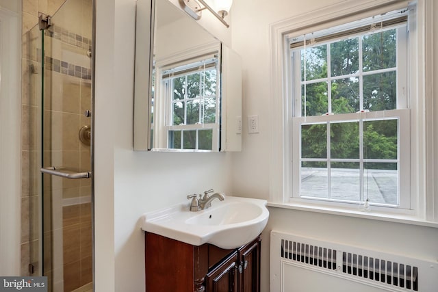 2739 Chesapeake St NW, Washington, DC 20008 - full bathroom featuring radiator, vanity, and a shower stall