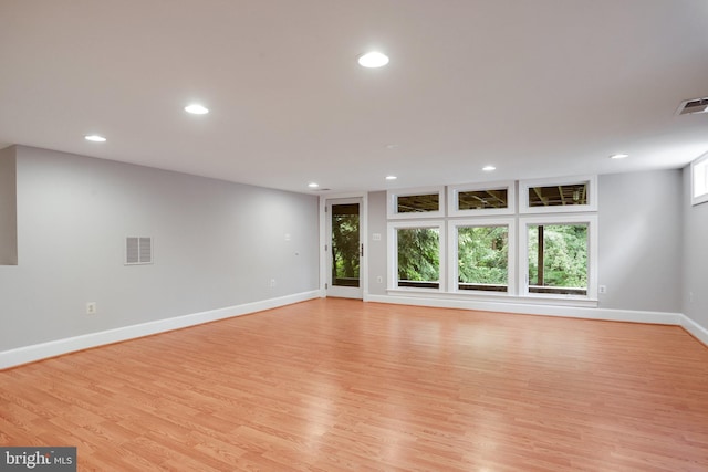 2739 Chesapeake St NW, Washington, DC 20008 - unfurnished living room featuring recessed lighting, light wood-style flooring, and baseboards