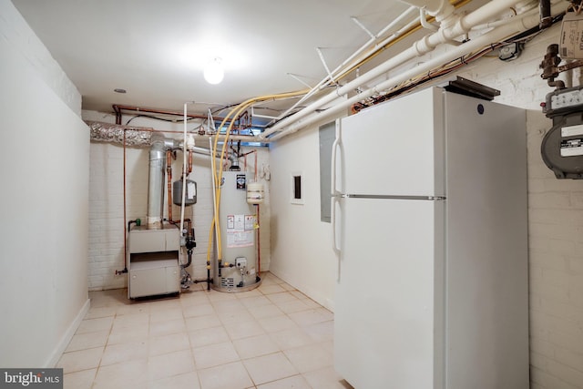2739 Chesapeake St NW, Washington, DC 20008 - unfinished below grade area featuring freestanding refrigerator, gas water heater, and a heating unit
