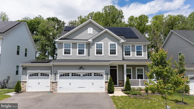 3163 Dodder Way, Odenton, MD 21113 - view of front of home featuring a porch, solar panels, and asphalt driveway