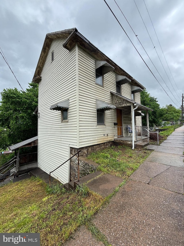 353 Pine St, Bellefonte, PA 16823 - view of side of property featuring covered porch