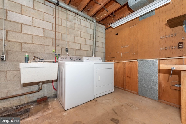 611 N Ct, Linthicum Heights, MD 21090 - washroom featuring washing machine and clothes dryer and concrete block wall