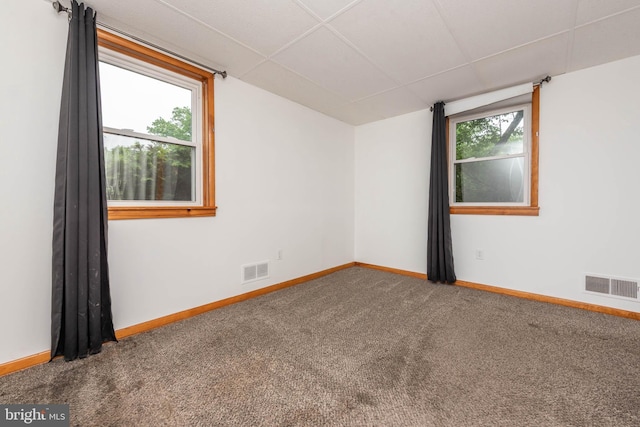 611 N Ct, Linthicum Heights, MD 21090 - carpeted spare room featuring baseboards and a paneled ceiling