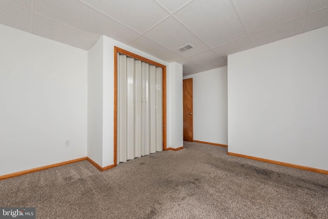 611 N Ct, Linthicum Heights, MD 21090 - carpeted spare room featuring a paneled ceiling and baseboards