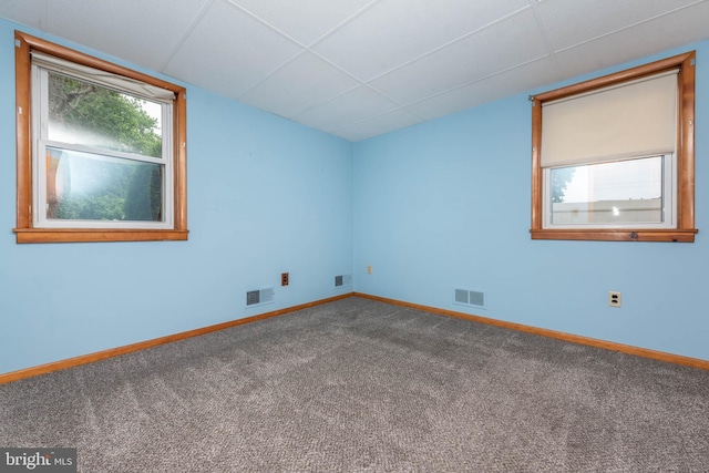 611 N Ct, Linthicum Heights, MD 21090 - carpeted spare room with baseboards and a drop ceiling
