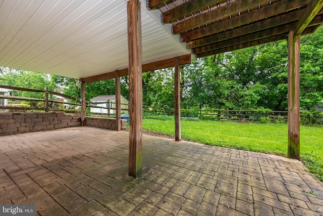 611 N Ct, Linthicum Heights, MD 21090 - view of patio featuring an outbuilding and a storage unit