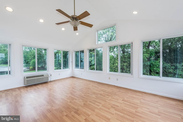 611 N Ct, Linthicum Heights, MD 21090 - unfurnished sunroom with a wall unit AC, wood finished floors, recessed lighting, high vaulted ceiling, and baseboards