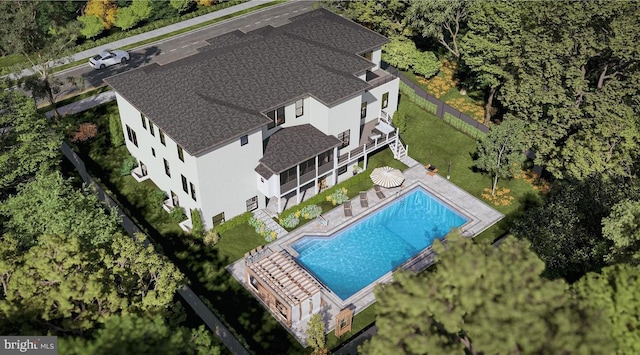 view from above of property with a pool area