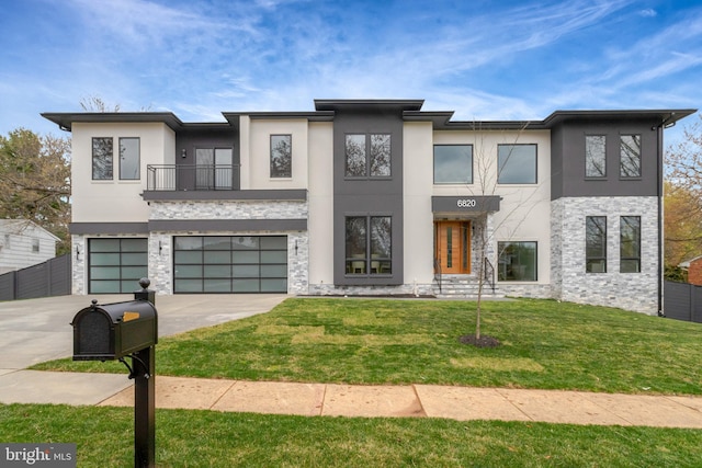 modern home with stucco siding, a balcony, stone siding, a garage, and driveway