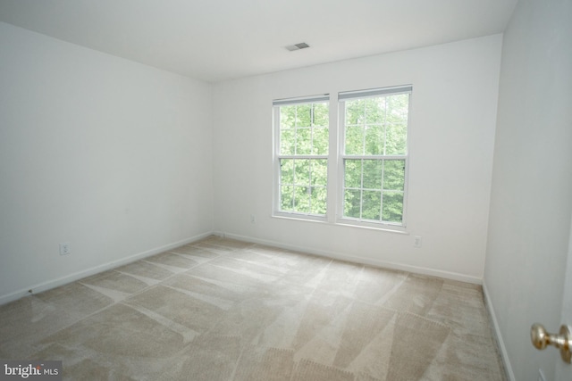 13076 Dove Tree Ct, Manassas, VA 20112 - carpeted spare room with baseboards
