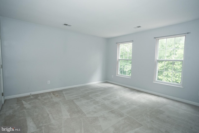 13076 Dove Tree Ct, Manassas, VA 20112 - spare room with baseboards and light colored carpet