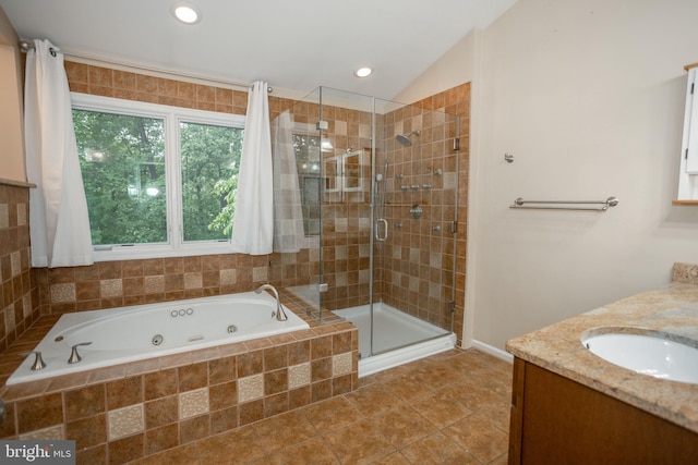 13076 Dove Tree Ct, Manassas, VA 20112 - full bathroom featuring a stall shower, a tub with jets, recessed lighting, vanity, and vaulted ceiling
