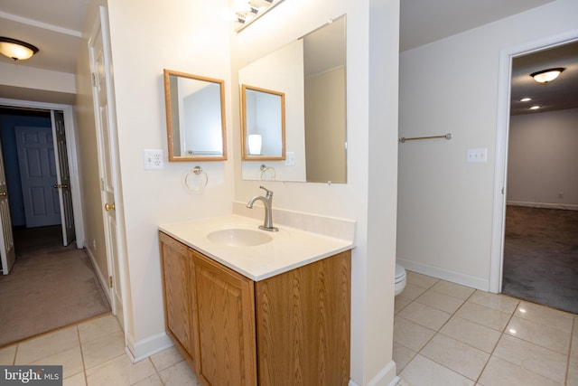 13076 Dove Tree Ct, Manassas, VA 20112 - bathroom with tile patterned flooring, vanity, toilet, and baseboards