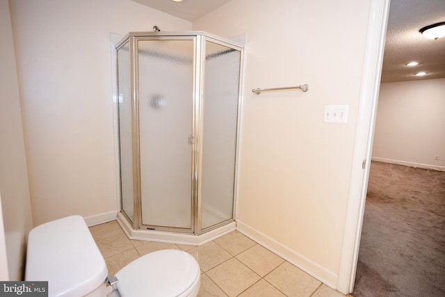13076 Dove Tree Ct, Manassas, VA 20112 - full bath with toilet, a stall shower, baseboards, and a textured ceiling