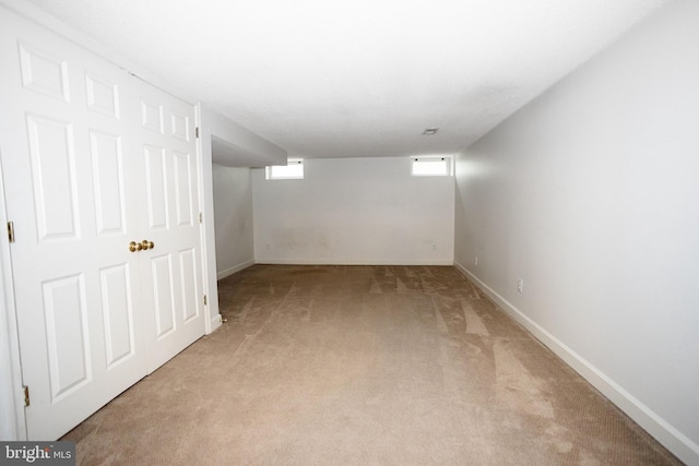 13076 Dove Tree Ct, Manassas, VA 20112 - basement with light colored carpet and baseboards