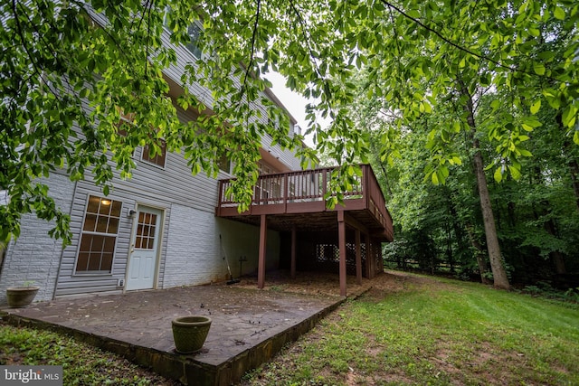 13076 Dove Tree Ct, Manassas, VA 20112 - back of property with a patio, a deck, and a yard