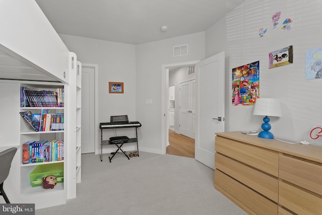 bedroom featuring carpet floors and baseboards