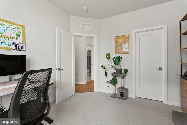 office with carpet and baseboards
